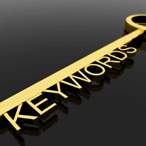 Gold Key With Keywords Text As Symbol For SEO Or Optimization